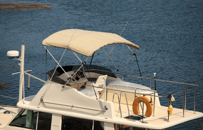 Use a bimini top to stay cool on a boat