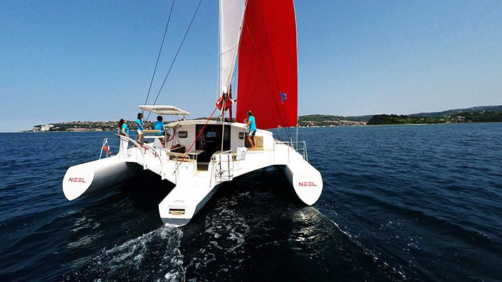 Trimaran sailing yacht on the water