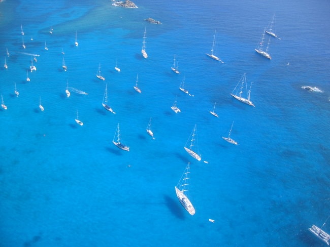 Sailing yachts on the water in the Bahamas