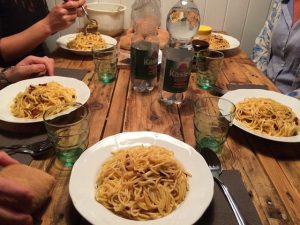 People eating pasta in a restaurant in Florence