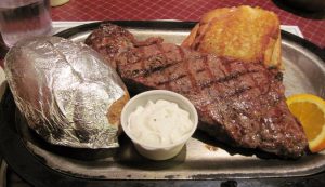 Beef steak with potato on a plate