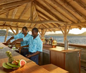 Two barman in a bar in St-Vincent