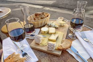 Plate of cheese and wine on the table