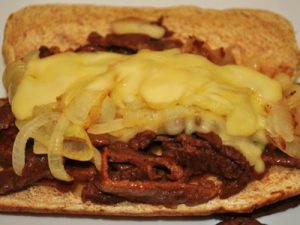 Steak cheese sandwich on a plate