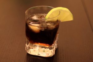 Rum and coke drink in a glass