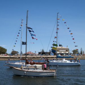 Boats sailing in flotilla