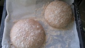 Two piece of dough on a plate