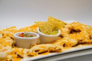 Nachos with cheese boat snack