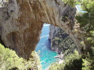 Boat tour at natural arch in Capri