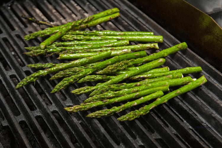 Grill asparagus on a boat